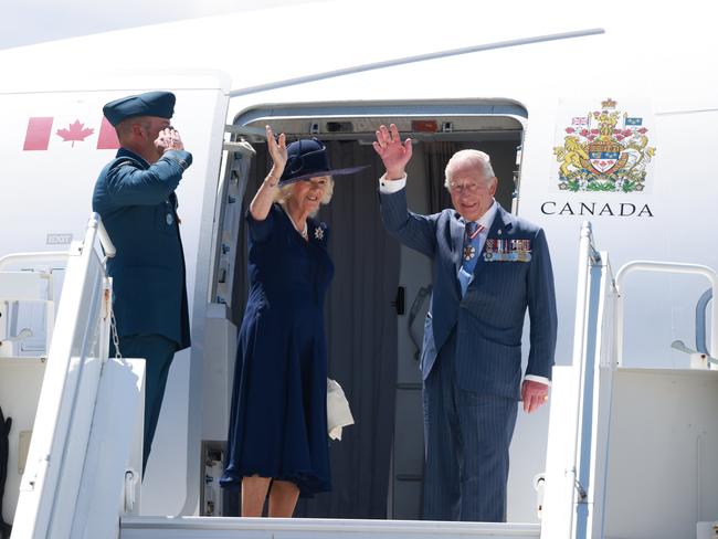 King Charles III and Queen Camilla wave goodbye as they enter the aeroplane at the end of an official visit to Canada. Picture: Getty Images