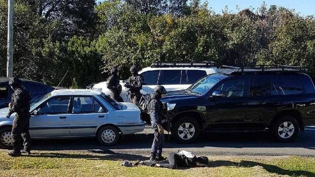 Heavily armed police arrested Keith Evans and a woman at Wyee following Mr Thompson’s murder. Picture: WCS Computer Services