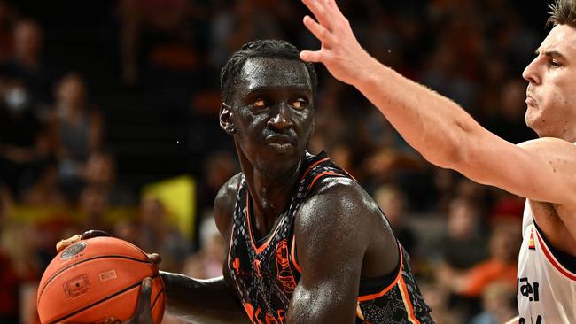 CAIRNS, AUSTRALIA - JANUARY 13: Akoldah Gak  of the Taipans catches the rebound during the round 15 NBL match between Cairns Taipans and Adelaide 36ers at Cairns Convention Centre, on January 13, 2024, in Cairns, Australia. (Photo by Emily Barker/Getty Images)