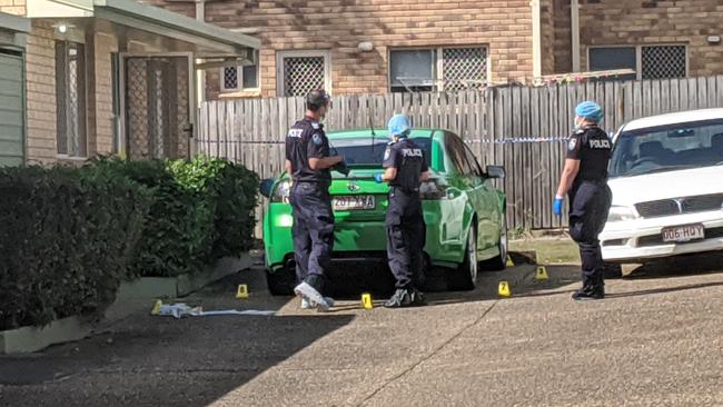 A photo of the deceased's car, a lime green Holden Commodore.