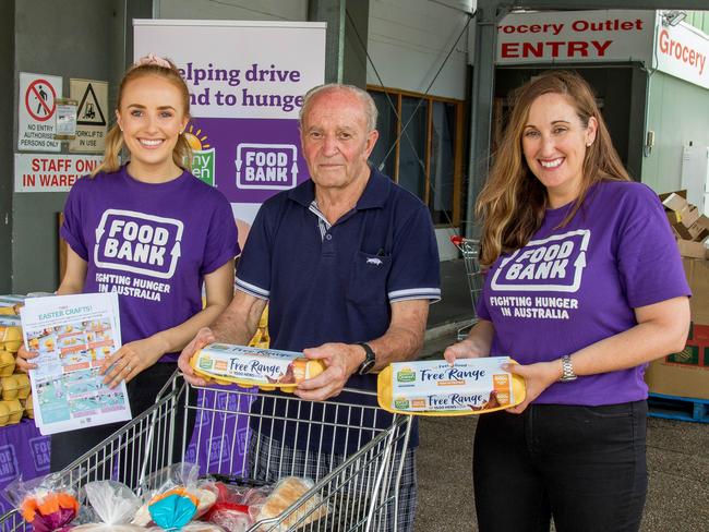 Zoe Templeton, Peter M and Gill Oddo with the donated Sunny Queen eggs, which will go to needy families this Easter.