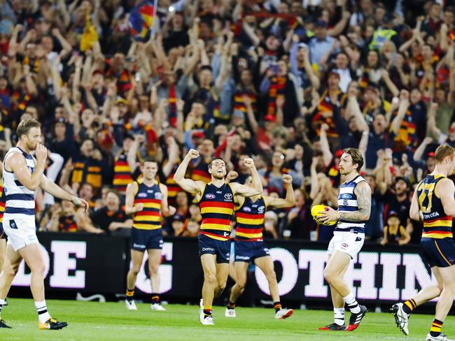 Adelaide players celebrate on the final siren. Picture: Michael Klein