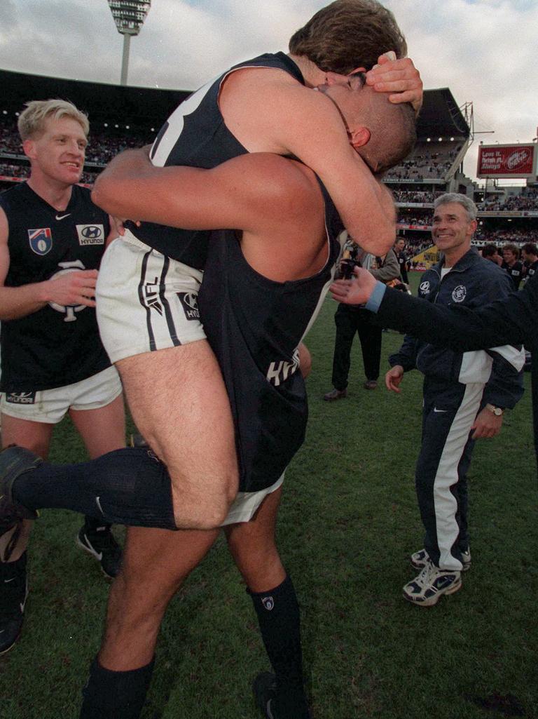 Blues players celebrate.