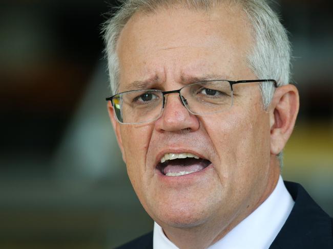 SYDNEY, AUSTRALIA - NewsWire Photos, FEBRUARY 02 2022: Prime Minister Scott Morrison visits the RAAF base at Richmond and addresses the media during a press conference in Sydney. Picture Gaye Gerard / NCA Newswire.