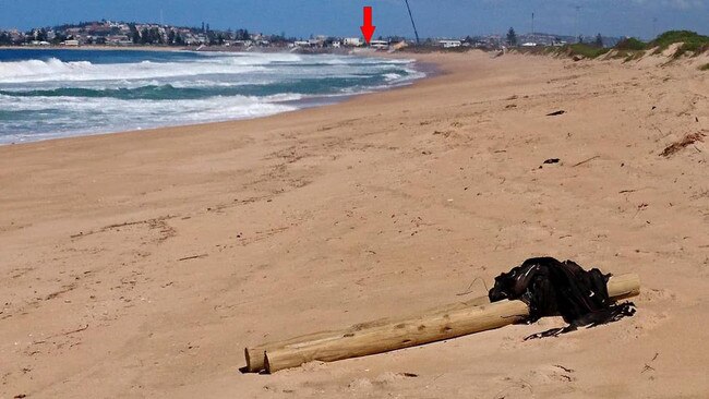 Where has all the sand gone? Poles and netting from fence can now be found 1500m north on the beach in front of Fort Wallace and the Stockton Hospital. Picture: Ron Boyd