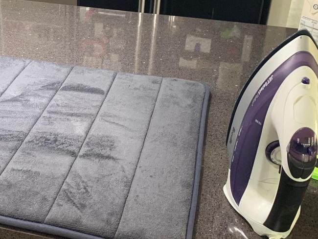 Mum replaces ironing board with memory foam bath mat