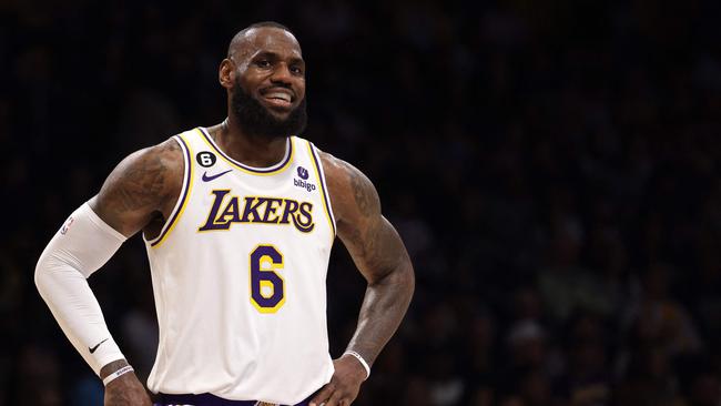 LOS ANGELES, CALIFORNIA - APRIL 09: LeBron James #6 of the Los Angeles Lakers laughs on the court during the first half against the Utah Jazz at Crypto.com Arena on April 09, 2023 in Los Angeles, California. NOTE TO USER: User expressly acknowledges and agrees that, by downloading and or using this photograph, User is consenting to the terms and conditions of the Getty Images License Agreement.   Harry How/Getty Images/AFP (Photo by Harry How / GETTY IMAGES NORTH AMERICA / Getty Images via AFP)