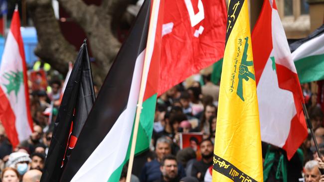 A yellow Hezbollah flag (right) at a previous pro-Palestine rally in Sydney. Picture: NewsWire / Damian Shaw