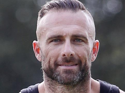 Pictured exercising at Centennial Park in Sydney is Steve "Commando" Willis.Picture: Richard Dobson