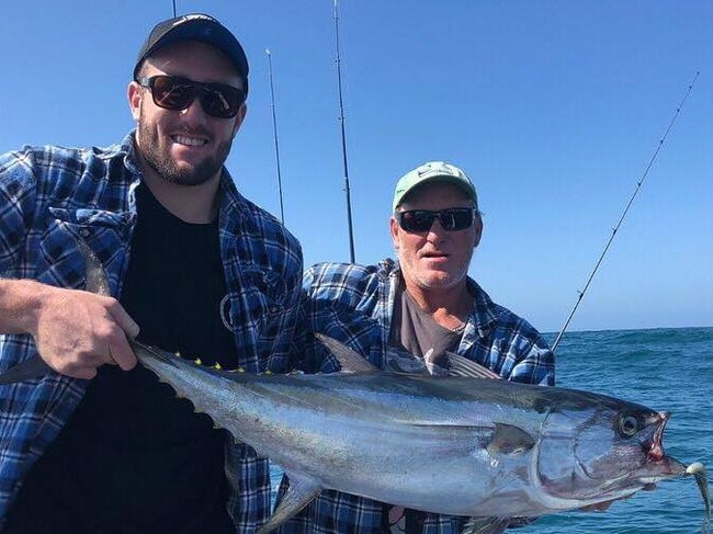 Wallabies lock Izack Rodda with his father Jon on a fishing trip. Picture: Facebook