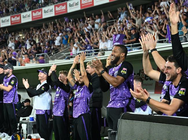 HOBART, AUSTRALIA - JANUARY 27: Hurricanes players celebrate Mitch Owen of the Hurricanes scoring a century during the BBL The Final match between Hobart Hurricanes and Sydney Thunder at Ninja Stadium on January 27, 2025 in Hobart, Australia. (Photo by Steve Bell/Getty Images)