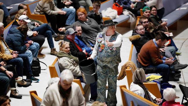 A volunteer collects voter ballots at a caucus at Franklin Junior High. Picture: Getty Images