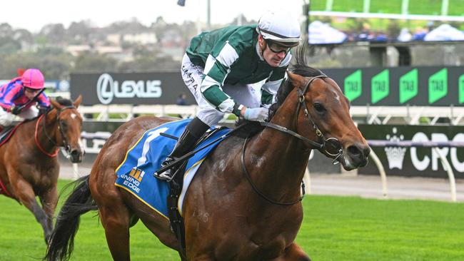 MELBOURNE, AUSTRALIA - SEPTEMBER 14: Mark Zahra riding Growing Empire winning Race 4, the Winning Edge Poseidon Stakes - Betting Odds during Melbourne Racing at Flemington Racecourse on September 14, 2024 in Melbourne, Australia. (Photo by Vince Caligiuri/Getty Images)