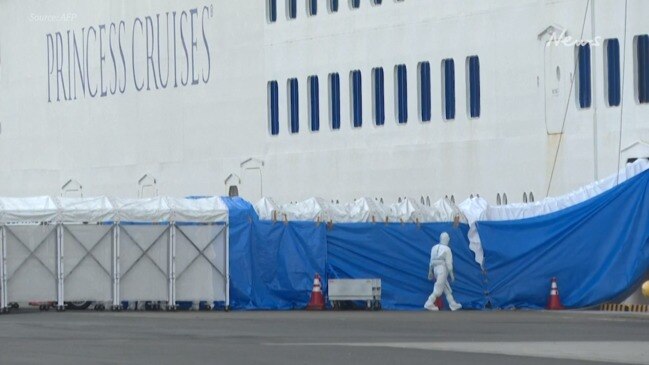 Ambulances wait outside quarantined cruise ship