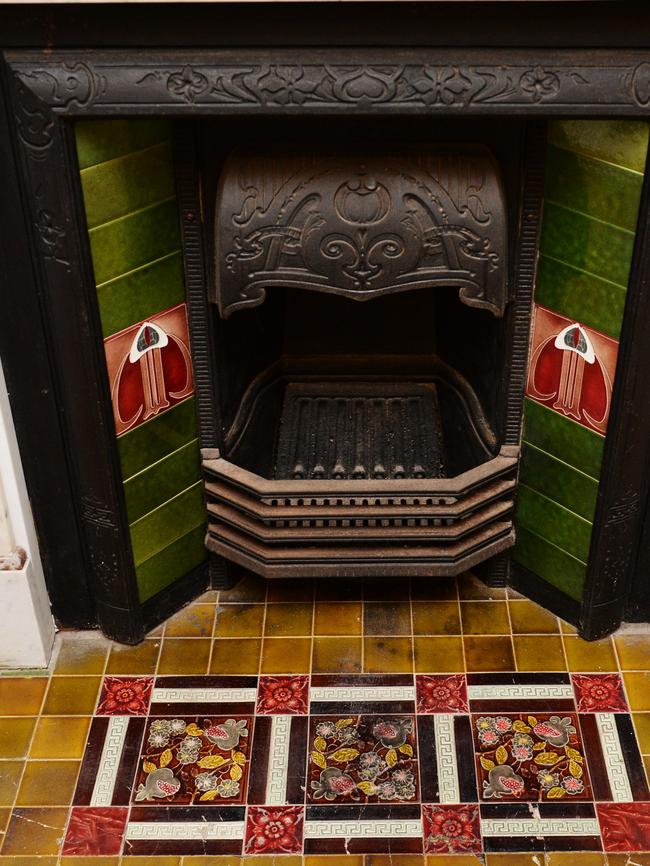 Beautiful heritage tiles surround one of the fireplaces.