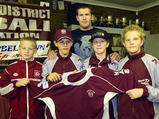 Macarthur Rams under-12s players Shannon Fielding, Anthony Proia, Ryan Harvey and Josh Banks with Brett Emerton in 2006. Picture: ROBERT POZO.