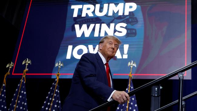 Republican presidential candidate and former US president Donald Trump takes the stage during his Iowa caucuses night watch party in Des Moines. Picture: Reuters