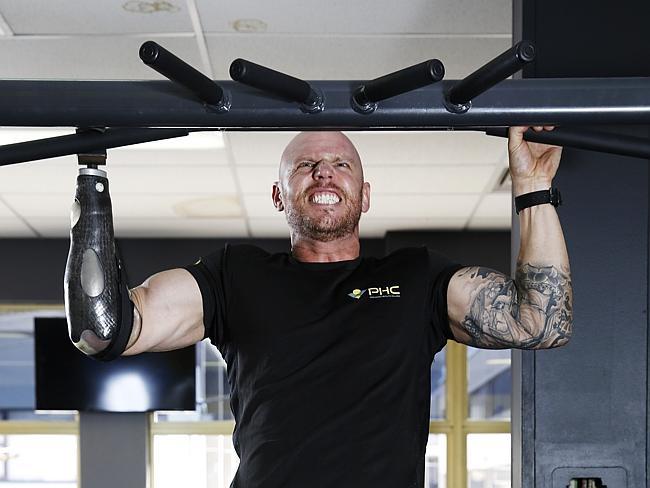 Shark attack survivor and former Navy Diver, Paul de Gelder working out at PHC gym at Neutral Bay.