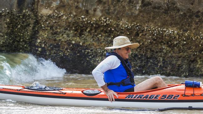 The PM makes it back to the beach after a kayak on Sydney Harbour. Picture: Jenny Evans