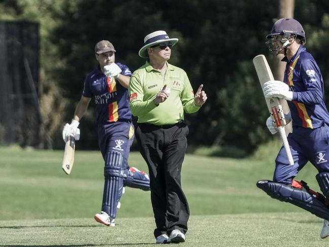 Stick ‘em up: Old Peninsula’s Tom La Brooy (right) smashed a six off the last ball of the innings. Picture: Valeriu Campan