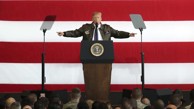 U.S. President Donald Trump delivers a speech for the U.S. troops at the U.S. Yokota Air Base, on the outskirts of Tokyo, Sunday, Nov. 5, 2017.  President Trump arrived in Japan Sunday on a five-nation trip to Asia, his second extended foreign trip since taking office and his first to Asia. The trip will take him to Japan, South Korea, China, Vietnam and Philippines for summits of the Asia-Pacific Economic Cooperation (APEC) and the Association of Southeast Asian Nations (ASEAN). (AP Photo/Eugene Hoshiko)