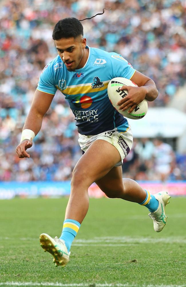 GOLD COAST, AUSTRALIA – JUNE 22: Alofiana Khan-Pereira of the Titans scores a try during the round 16 NRL match between Gold Coast Titans and New Zealand Warriors at Cbus Super Stadium, on June 22, 2024, in Gold Coast, Australia. (Photo by Chris Hyde/Getty Images)