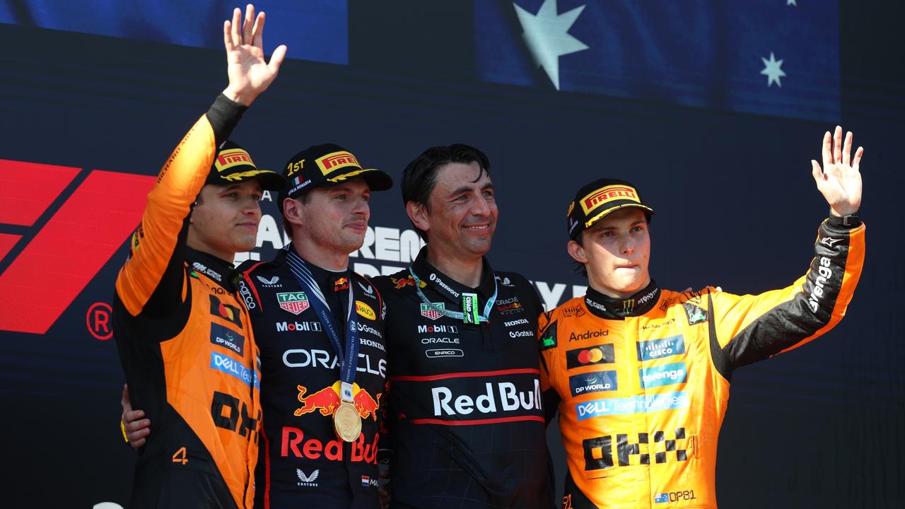 Race winner Max Verstappen (C) is flanked by Oracle Red Bull Racing’s Lando Norris (L) and Oscar Piastri (R). Picture: Getty