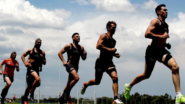 Jeremy Cameron leads players during a run. Picture. Phil Hillyard