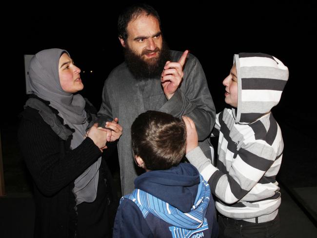 Convicted terrorist Belal Khazaal is greeted by his family.