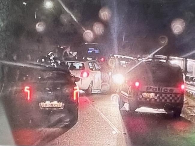 The scene at Riverlinks in Helensvale in the early hours of the morning on Thursday April 27 after residents used their own vehicles to block the escape of alleged thieves.