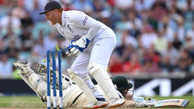 Smith seemed certain to be given out, but upon review was able to stay at the crease. (Photo by Stu Forster/Getty Images)