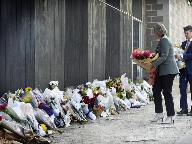 Premier Jacinta Allan and Deputy Premier Ben Carroll lay floral tributes at Auburn South Primary School after student Jack Davey was killed. Picture: Andrew Henshaw