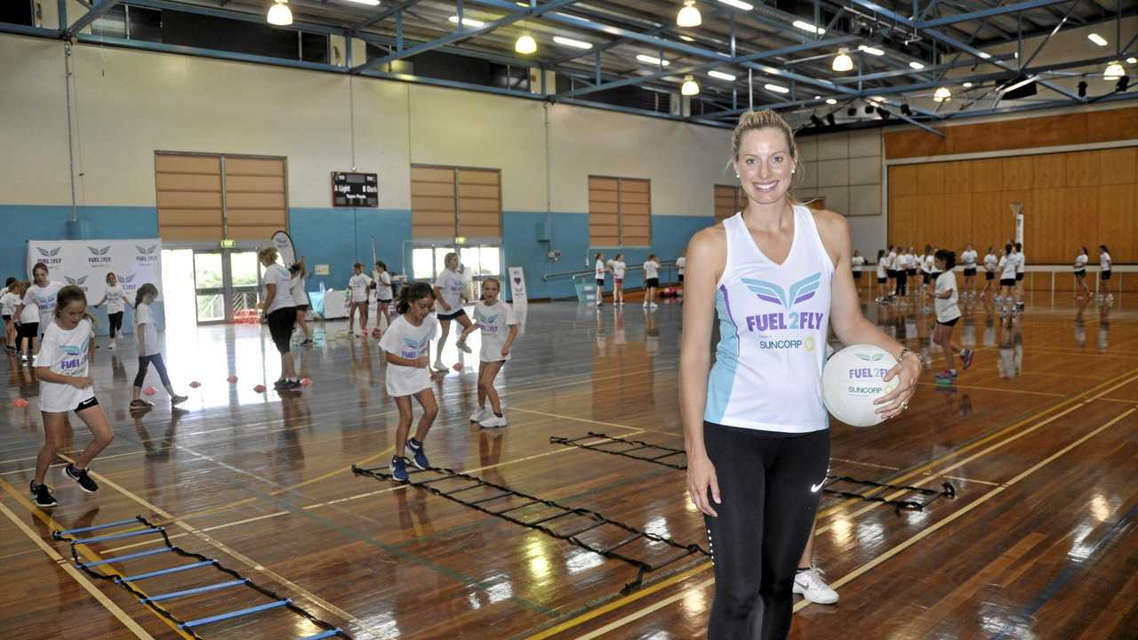 ON COURT: Former Queensland Firebirds and Australian Diamonds star Laura Geitz passed on some of her knowledge to young netballers during the Fuel2Fly netball clinic conducted at St Ursula's College earlier this week. Picture: Alyssa Welke