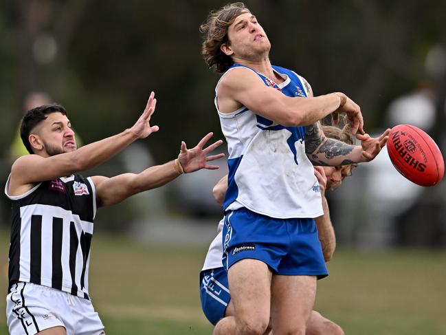 EDFL: Sunbury Kangaroos’ Thomas Borg lets the ball slip away. Picture: Andy Brownbill