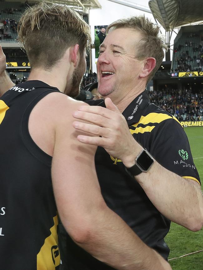 Mark Stone congratulates Jonty Scharenberg after Glenelg’s grand final win. Picture: SARAH REED.