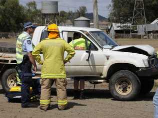 Emergency services at the scene of a two-vehicle crash on the Warrego Hwy. Picture: Bev Lacey