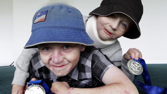 Pride of Australia awards at the Bellerive Century room picture of child of Courage award winners from left Fletcher and Spencer Connelly