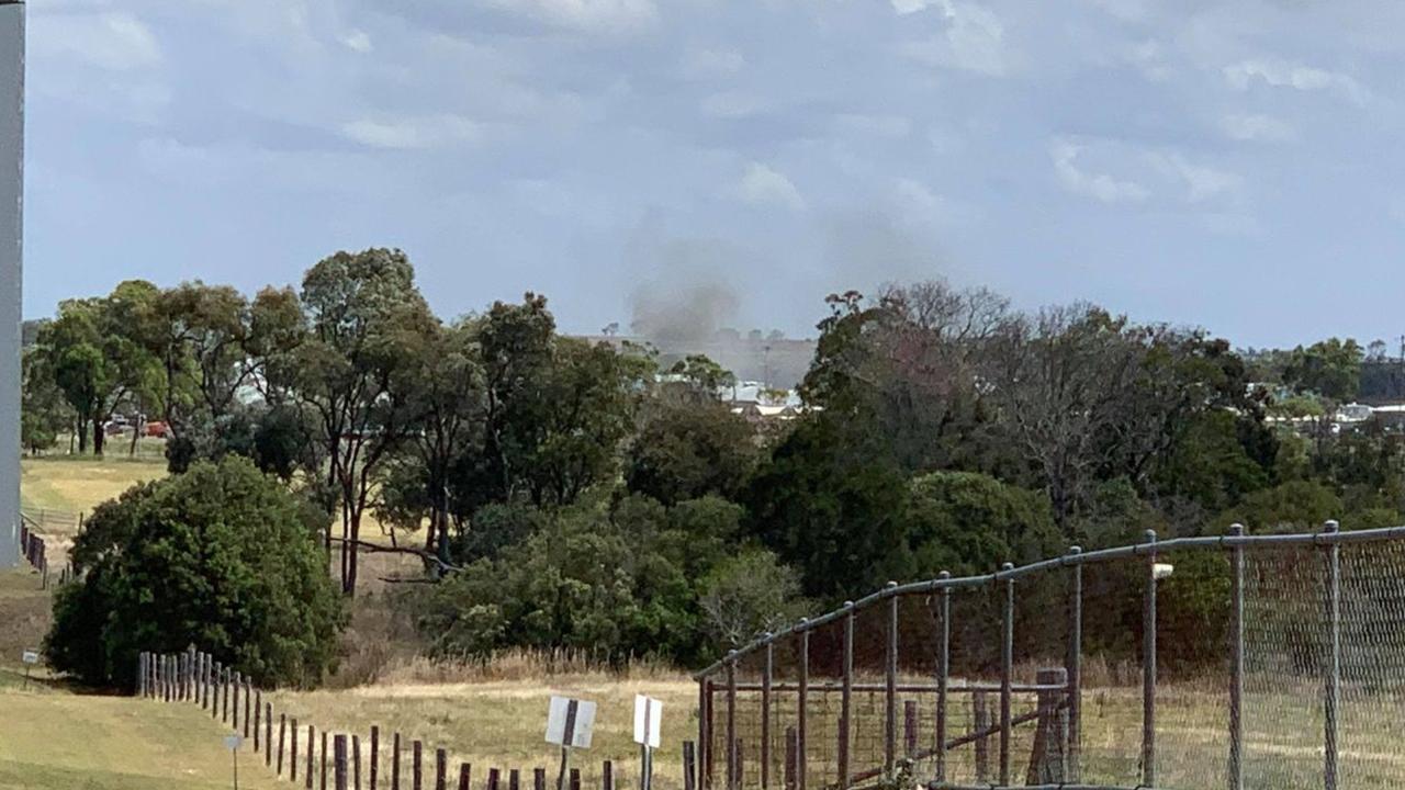 Smoke can be seen coming from the Capricornia Correctional Centre as a four hour riot continues.