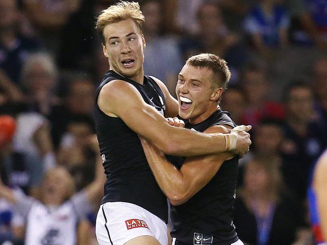 AFL Round 5. 21/04/2019. Western Bulldogs v Carlton at Marvel Stadium.   Harry McKay of the Blues celebrates a goal in the 4th qtr with Patrick Cripps    . Pic: Michael Klein.