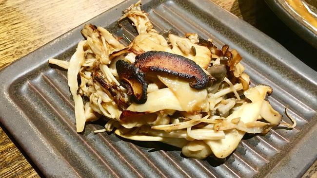 Mushrooms fried with sake.