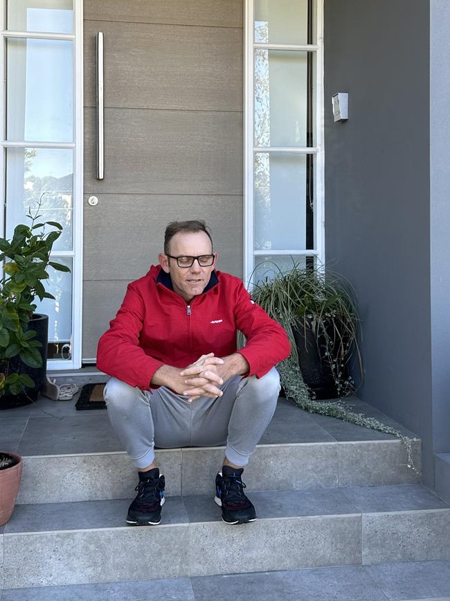 Mike and Kathryn Arnold stayed at a rental but didn’t pay rent after the first month and were taken to a tribunal. Mike pictured on the steps of the rental.