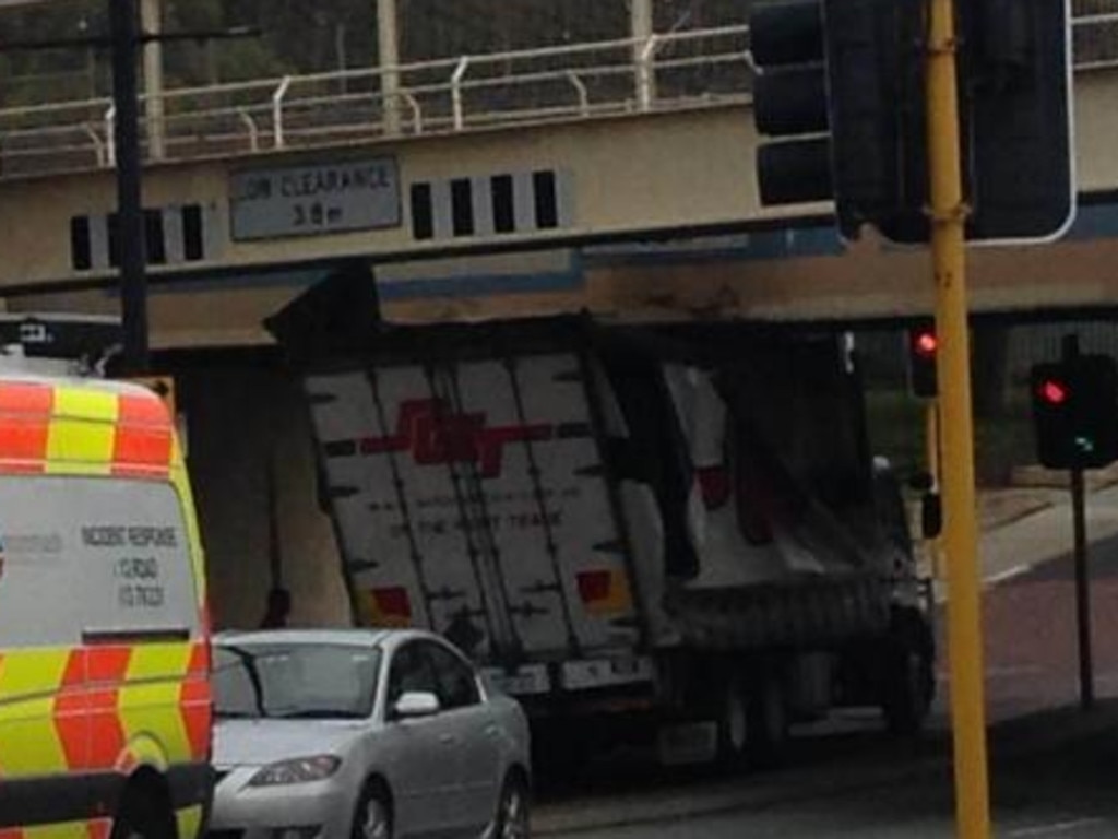 A truck has become stuck under the rail bridge in Bayswater this morning. Picture: Eastern Reporter, Twitter