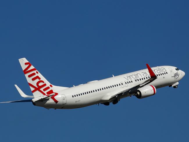 SYDNEY, AUSTRALIA - SEPTEMBER 23, 2020:  Virgin Planes seen at Terminal 2 in the Sydney Domestic Airport in Sydney, Australia, on SEPTEMBER 23 2020. Picture: NCA Newswire / Gaye Gerard