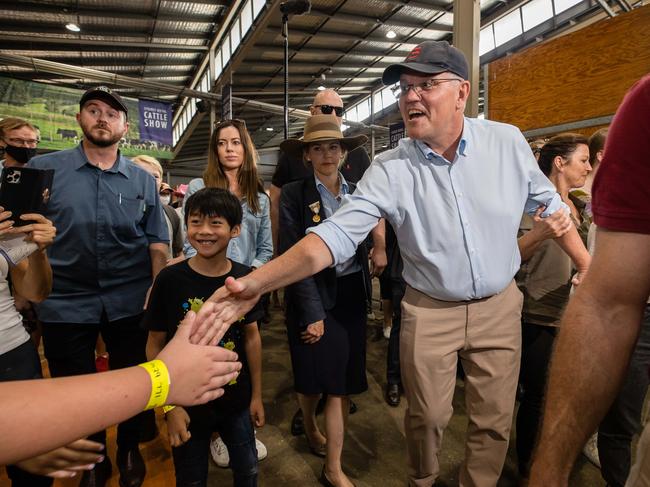 Mr Morrison and his family had a mainly warm welcome at Sydney’s Easter Show. Picture: Jason Edwards