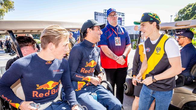 Liam Lawson, Daniel Ricciardo and Oscar Piastri having a chat. Picture: Jake Nowakowski