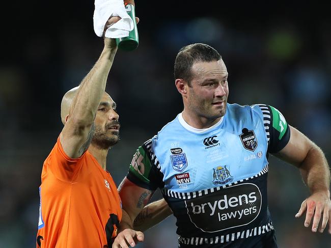 ADELAIDE, AUSTRALIA - NOVEMBER 04: Boyd Cordner of the Blues is assisted by a trainer after a head knock during game one of the 2020 State of Origin series between the Queensland Maroons and the New South Wales Blues at the Adelaide Oval on November 04, 2020 in Adelaide, Australia. (Photo by Mark Kolbe/Getty Images)
