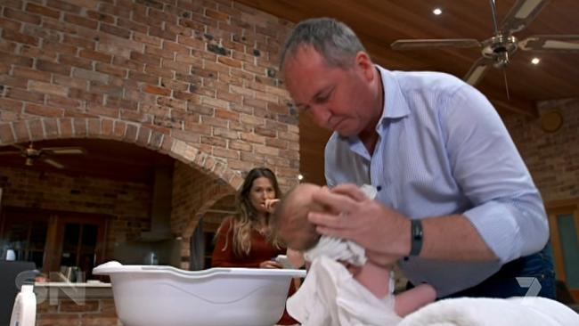 The couple bath baby Sebastian on Seven’s Sunday Night. Picture: Channel 7