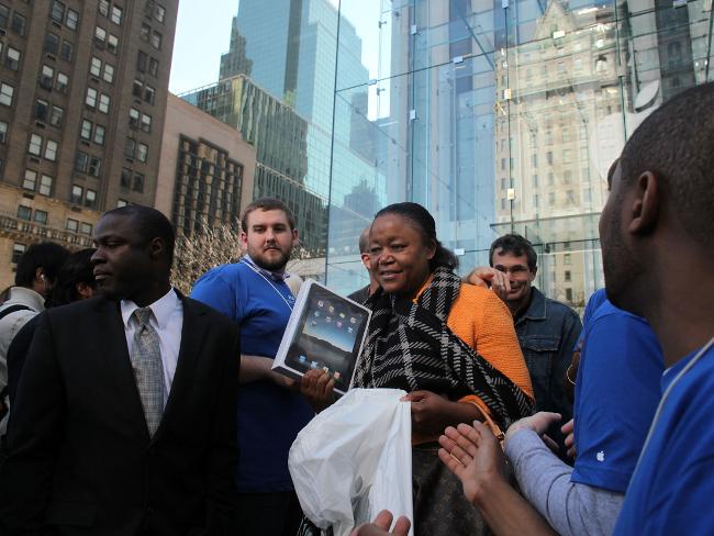 <p>An early customer emerges from the Apple store on Fifth Avenue with Apple's new iPad on April 3, 2010 in New York City. Picture: Spencer Platt/Getty Images/AFP</p>