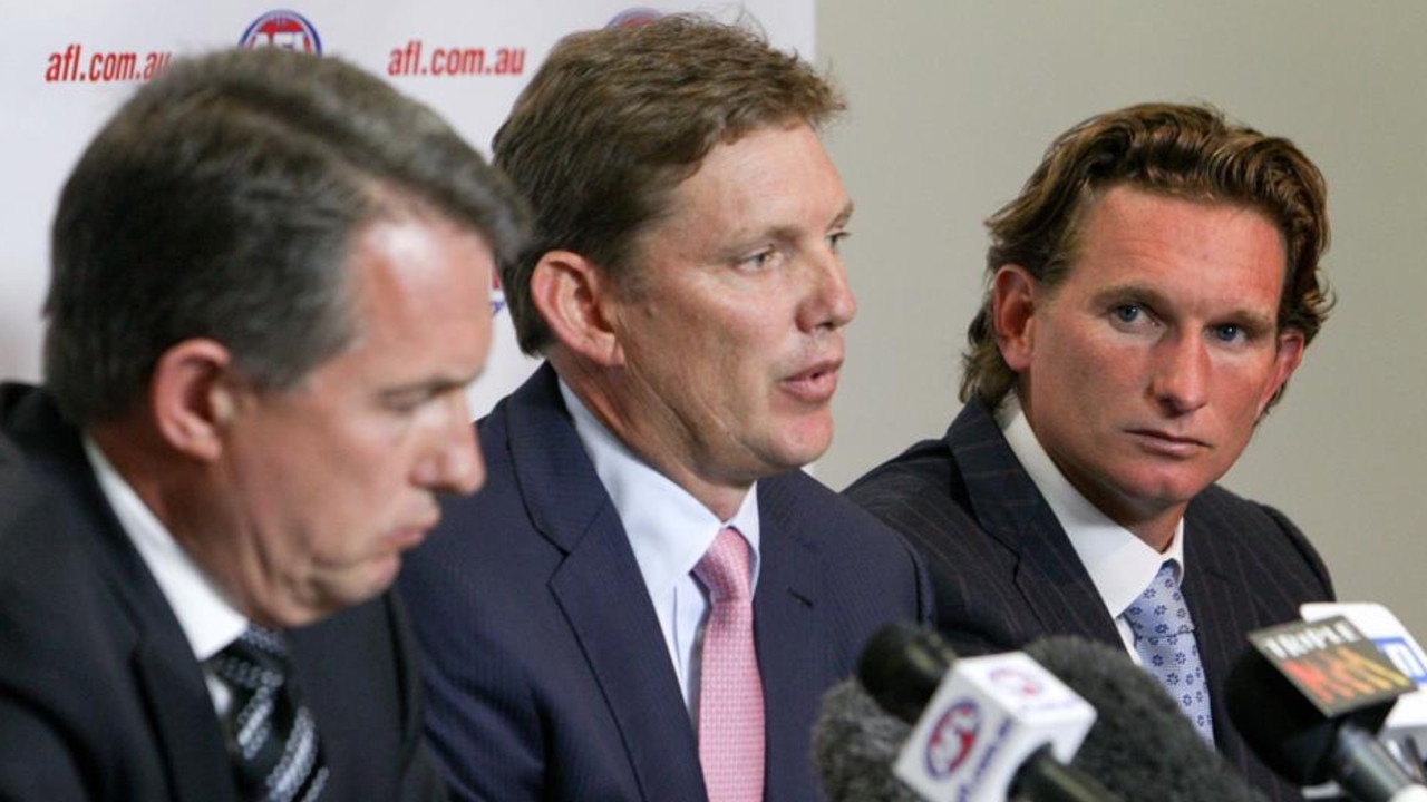 Essendon chairman David Evans (centre) faces the media on February 5, 2013 alongside CEO Ian Robson and coach James Hird.