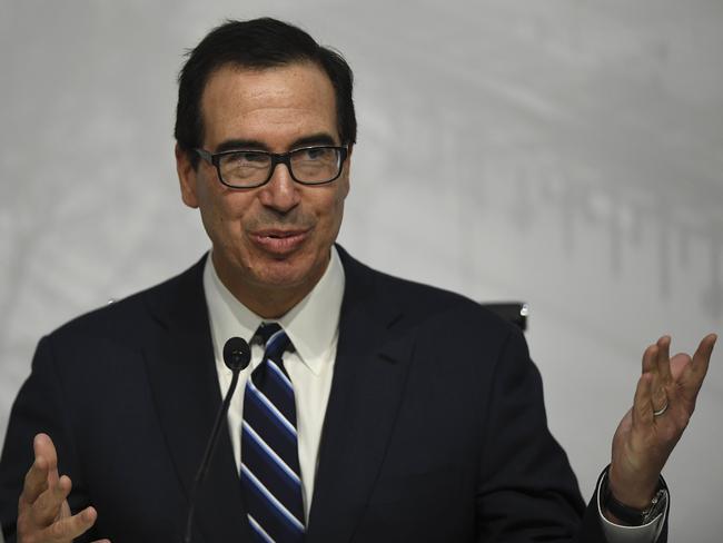 (FILES) In this file photo taken on July 22, 2018 US Secretary of the Treasury Steven Mnuchin, gestures during a press conference in Buenos Aires, at the end of the G20 Finance Ministers and Central Bank Governors meeting. - The United States hopes to strike a quick bargain with Canada after reaching an agreement with Mexico this week on continent-wide trade, US Treasury Secretary Steven Mnuchin said August 28, 2018. Canada's Foreign Minister Chrystia Freeland was due in Washington to begin talks later Tuesday, one day after US President Donald Trump suggested he could cut Ottawa out of any final deal if disagreements persist in the year-long efforts to rewrite the North American Free Trade Agreement."I think our objective is to try to get Canada aboard quickly," Mnuchin said on CNBC. (Photo by EITAN ABRAMOVICH / AFP)